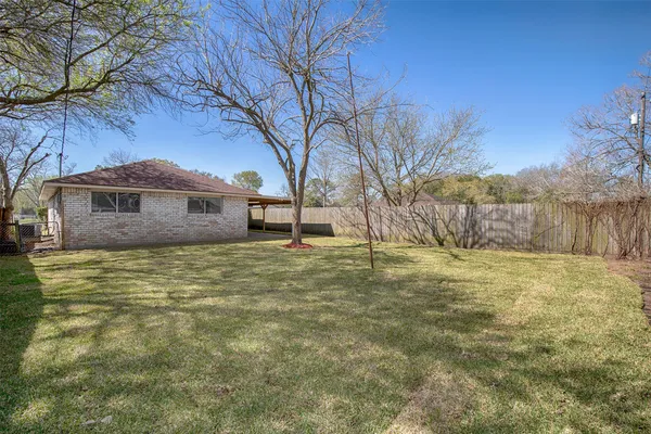 a view of backyard with green space