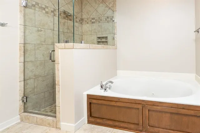 a bathroom with a sink and a shower