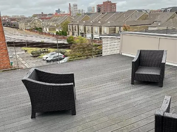 a view of a terrace with sitting area