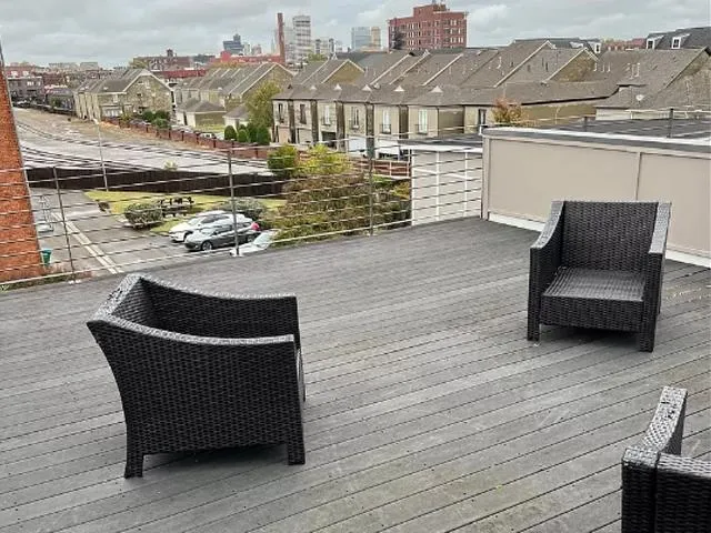 a view of a terrace with sitting area