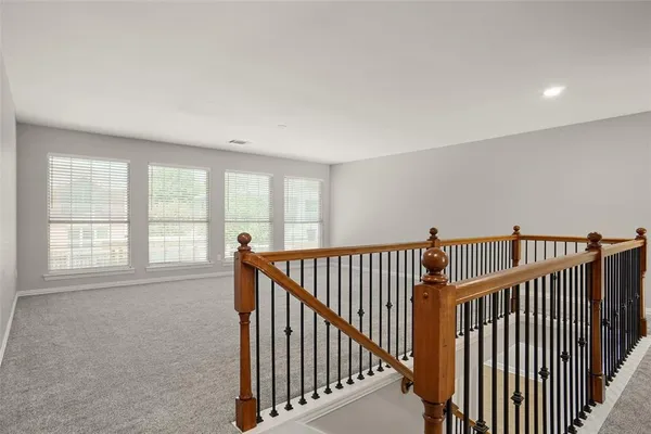 a view of hallway with stairs