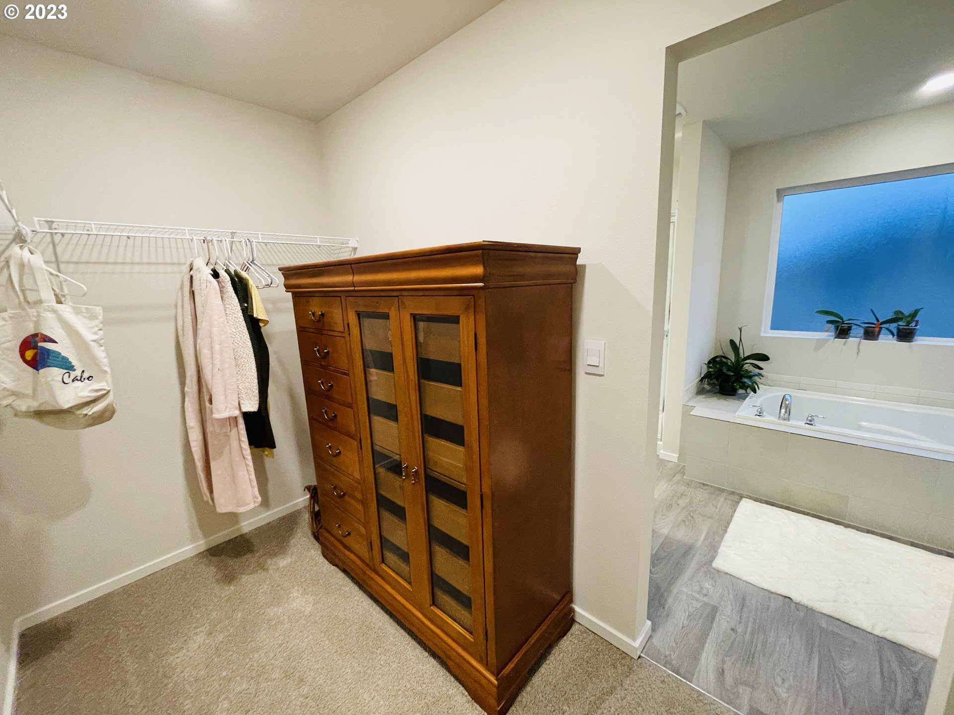 2927 W Street Springfield, OR 97477 - Photo 25 of 38 a view of walk in closet with clothes and shoes