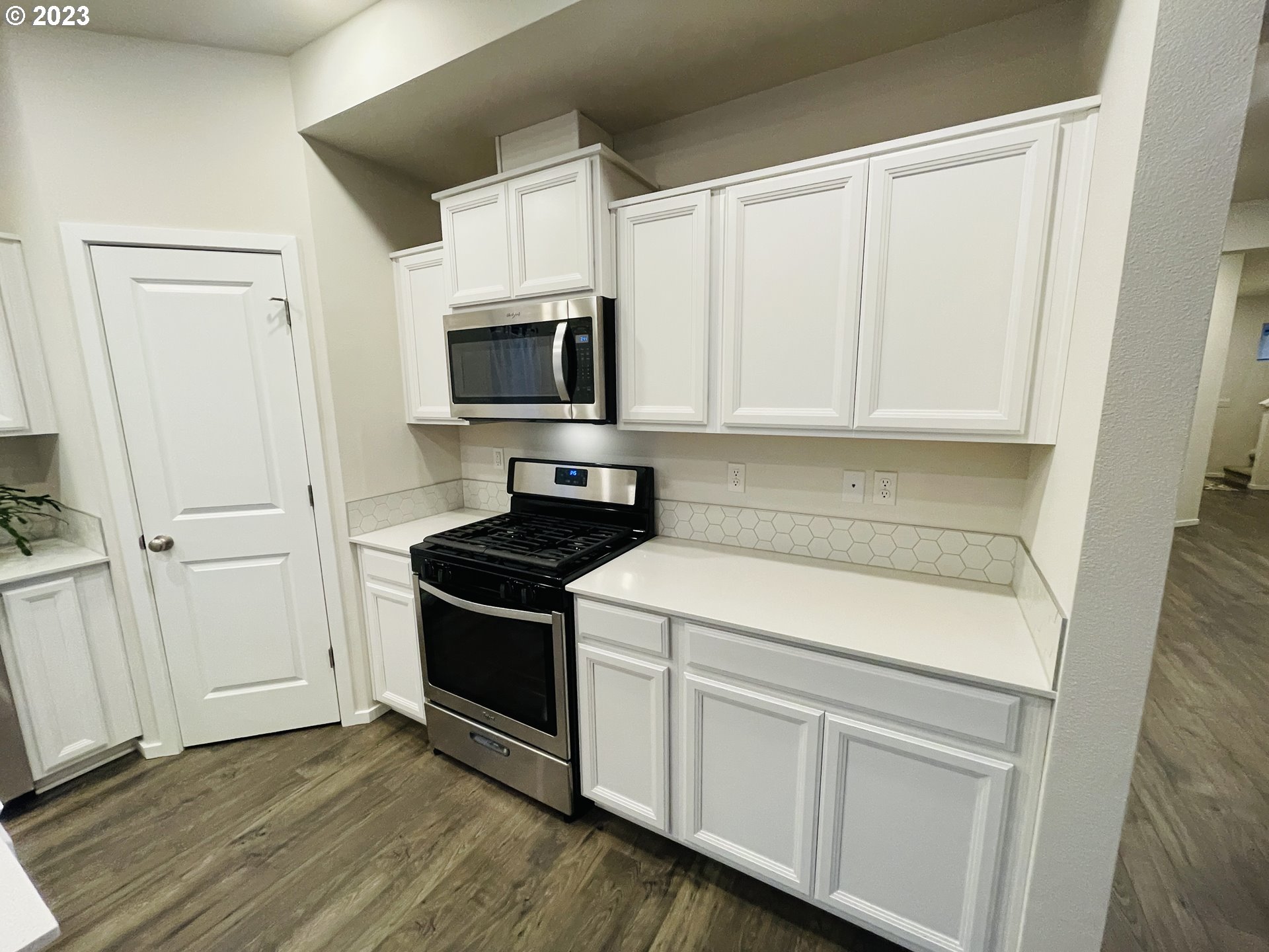 2927 W Street Springfield, OR 97477 - Photo 8 of 38 a kitchen with a stove and a microwave