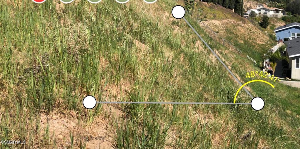 1071 Walnut Canyon Road Moorpark, CA 93021 - Photo 4 of 16 a view of a bathroom with a sink and mirror