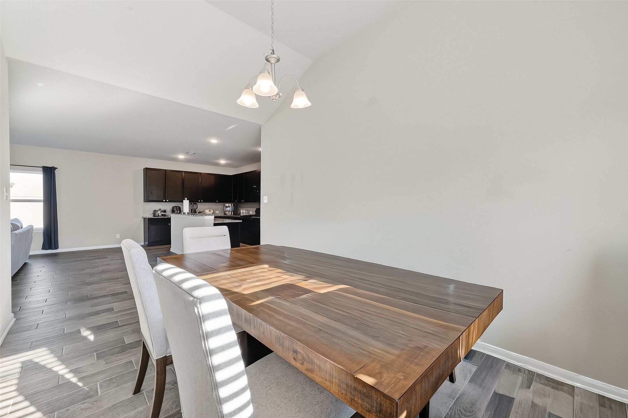 2422 Agassiz Drive Rosharon, TX 77583 - Photo 12 of 41 a view of a dining room with furniture and wooden floor
