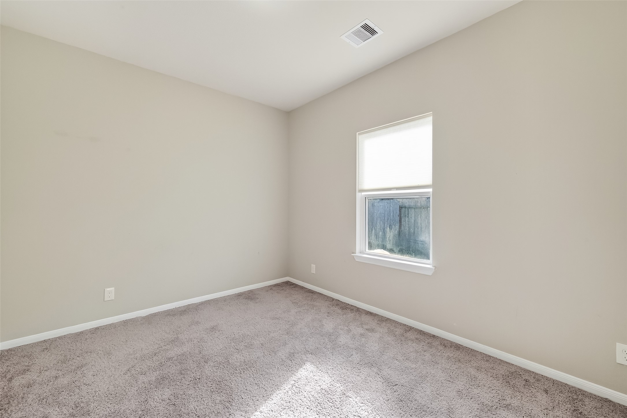 2422 Agassiz Drive Rosharon, TX 77583 - Photo 27 of 41 an empty room with a window