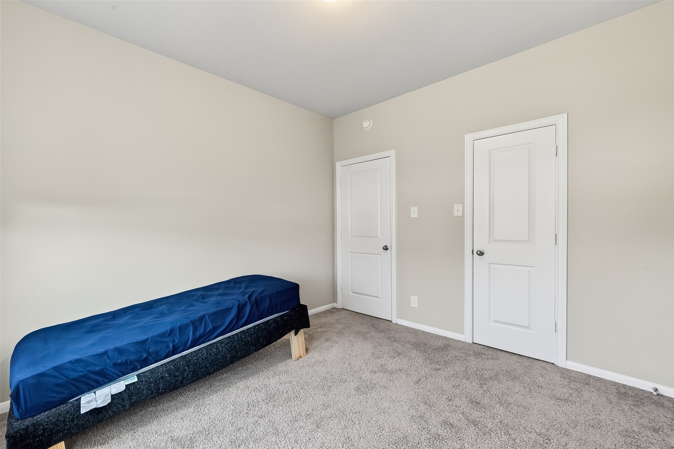 2422 Agassiz Drive Rosharon, TX 77583 - Photo 30 of 41 a room with a bed and a cabinet