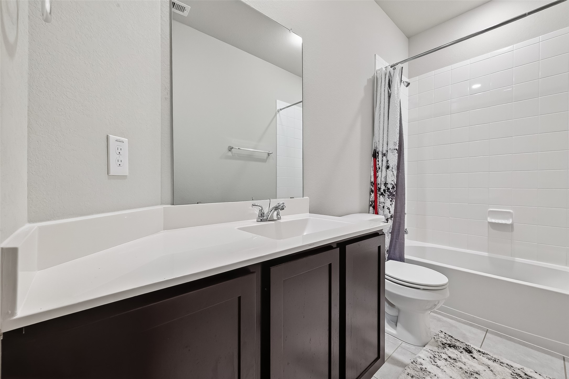 2422 Agassiz Drive Rosharon, TX 77583 - Photo 31 of 41 a bathroom with a sink a toilet and a large mirror