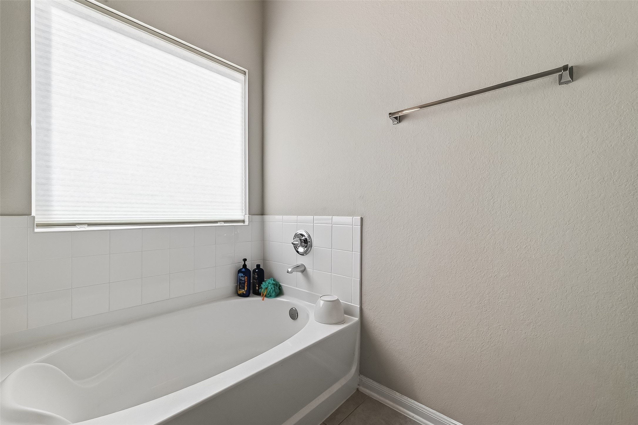 2422 Agassiz Drive Rosharon, TX 77583 - Photo 36 of 41 a bathroom with a bathtub and a shower
