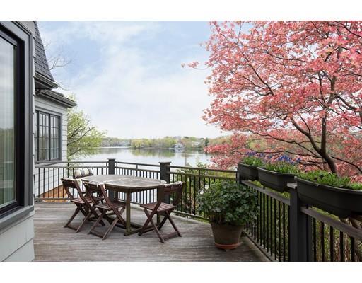 45 Hopkins Road Arlington, MA 02476 - Photo 2 of 12 a view of a roof deck with table and chairs and couches