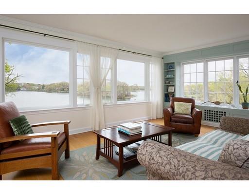 45 Hopkins Road Arlington, MA 02476 - Photo 3 of 12 a living room with furniture and a large window