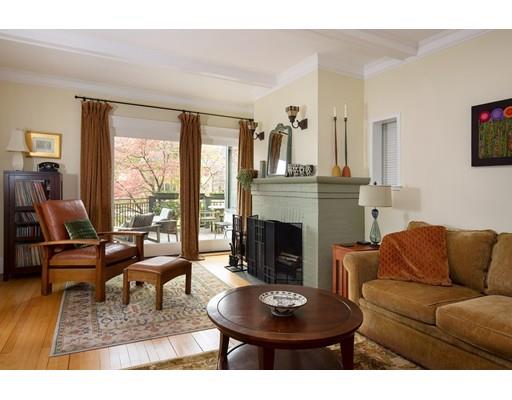 45 Hopkins Road Arlington, MA 02476 - Photo 4 of 12 a living room with furniture a fireplace and a flat screen tv