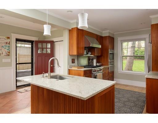 45 Hopkins Road Arlington, MA 02476 - Photo 5 of 12 a kitchen with a sink a stove and cabinets