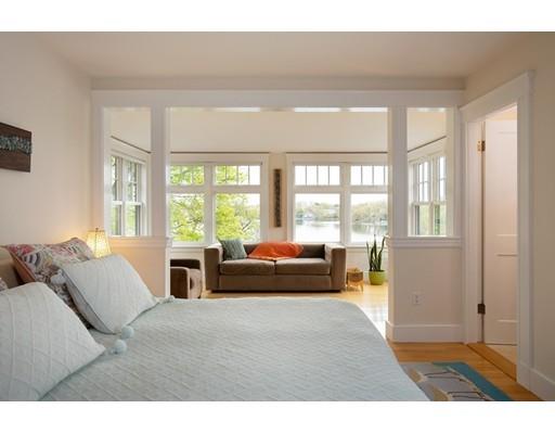 45 Hopkins Road Arlington, MA 02476 - Photo 8 of 12 a living room with furniture and large windows