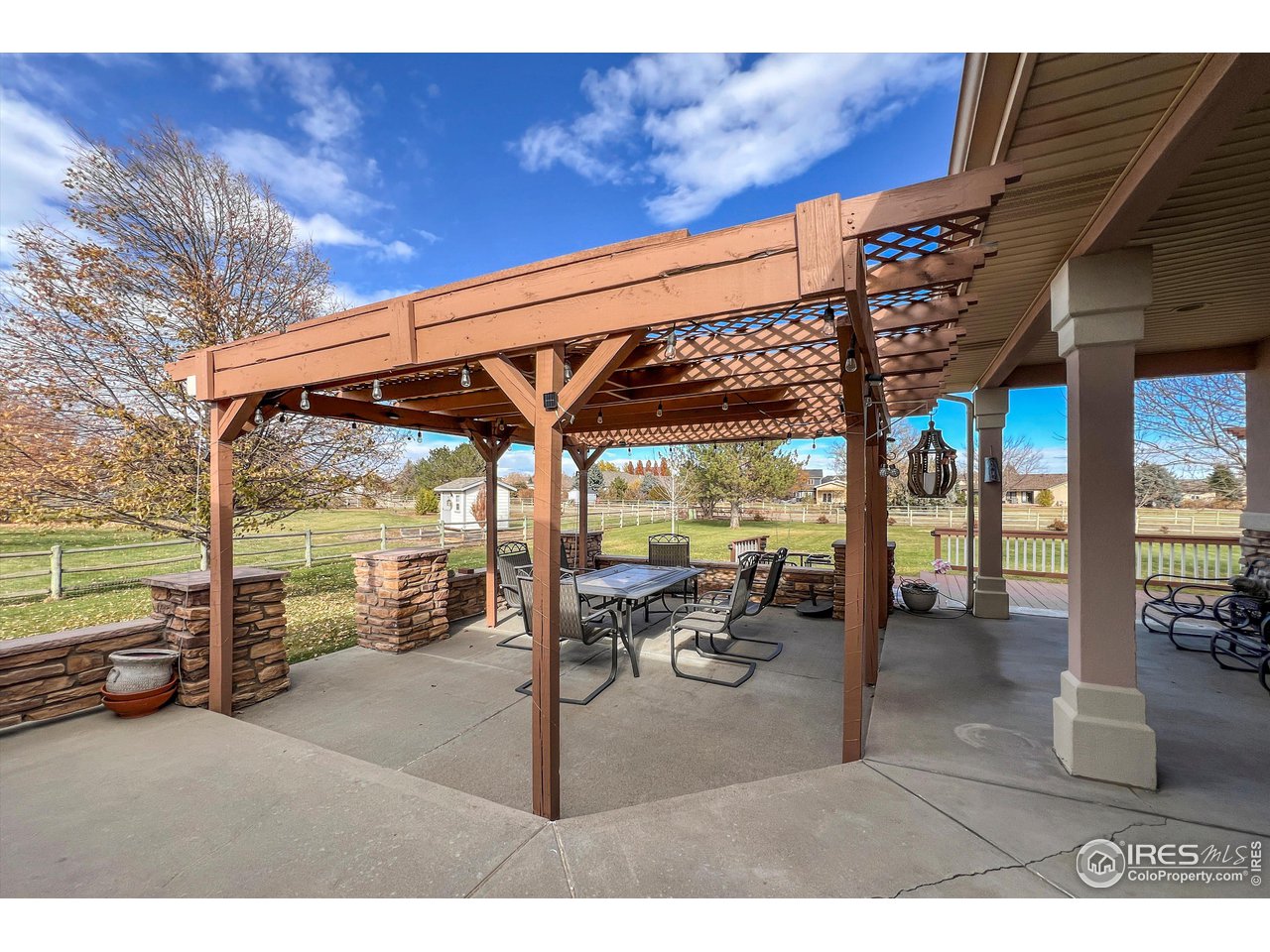 2111 Blue Mountain Road Longmont, CO 80504 - Photo 33 of 36 Back Patio with Pergola