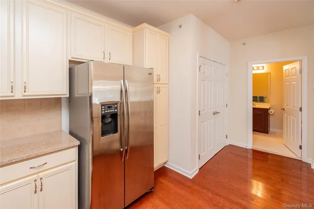 a kitchen with a sink and a window