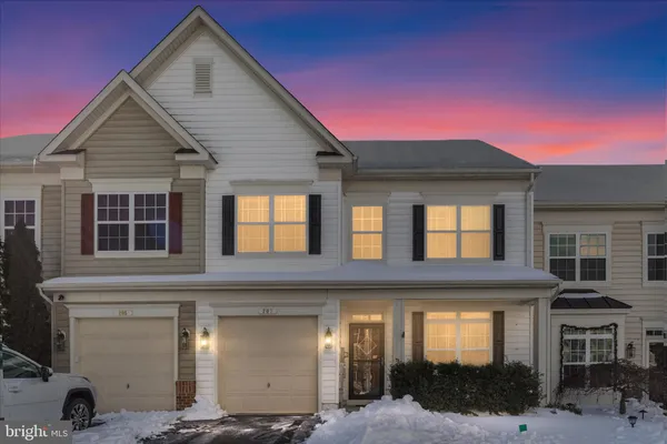 a view of a house with entrance gate