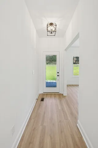 a view of an empty room and window