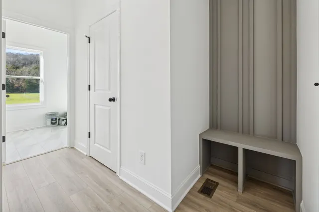 a view of an empty room and window