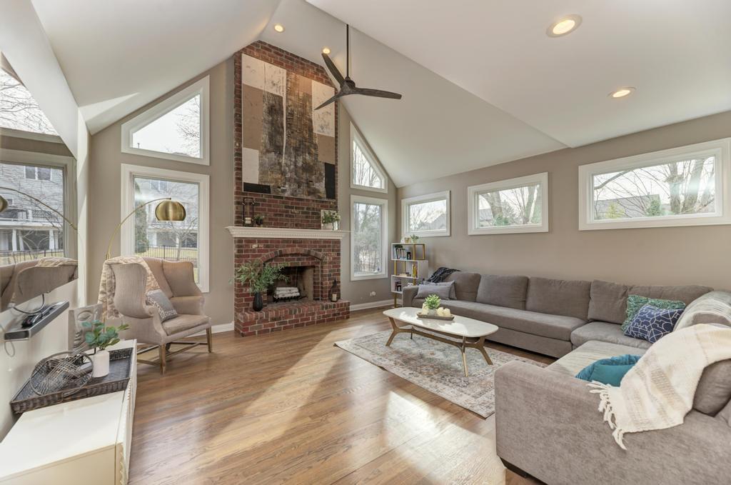 1061 Sean Circle Darien, IL 60561 - Photo 15 of 50 a living room with furniture fireplace and a large window