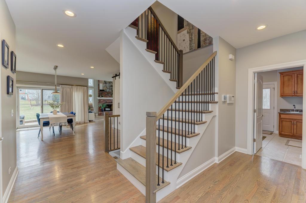 1061 Sean Circle Darien, IL 60561 - Photo 17 of 50 a view of dining room with wooden floor and windows