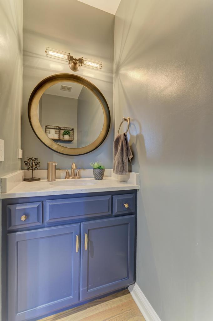 1061 Sean Circle Darien, IL 60561 - Photo 19 of 50 a bathroom with a sink and a mirror