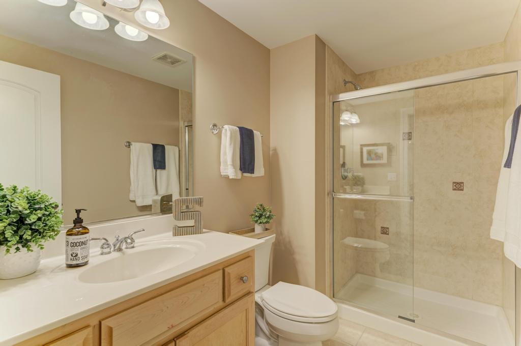 1061 Sean Circle Darien, IL 60561 - Photo 38 of 50 a bathroom with a sink a toilet and shower
