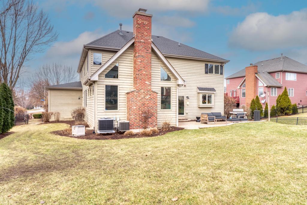 1061 Sean Circle Darien, IL 60561 - Photo 40 of 50 a view of a house with a yard and sitting space
