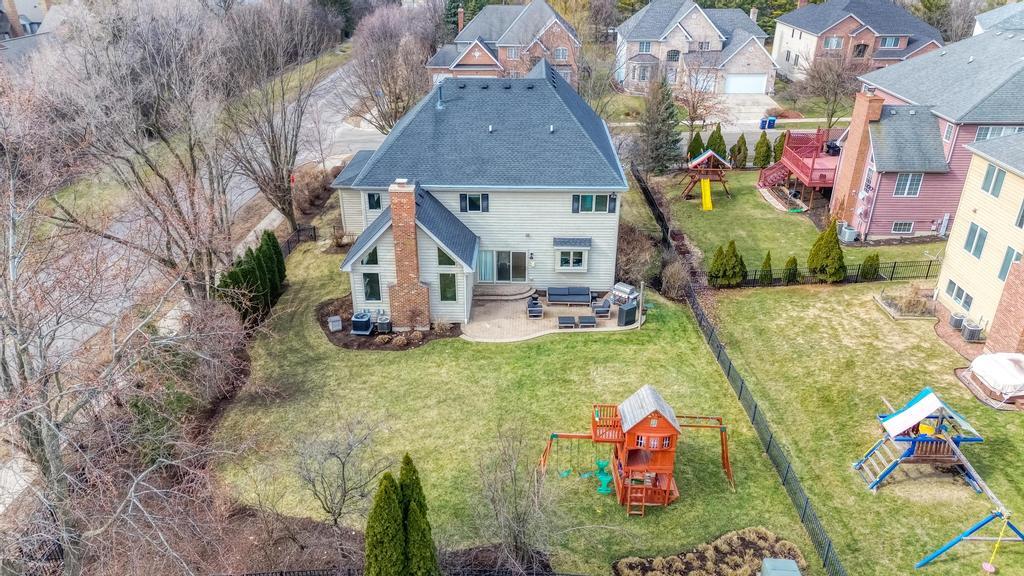 1061 Sean Circle Darien, IL 60561 - Photo 42 of 50 an aerial view of a house with swimming pool garden and patio