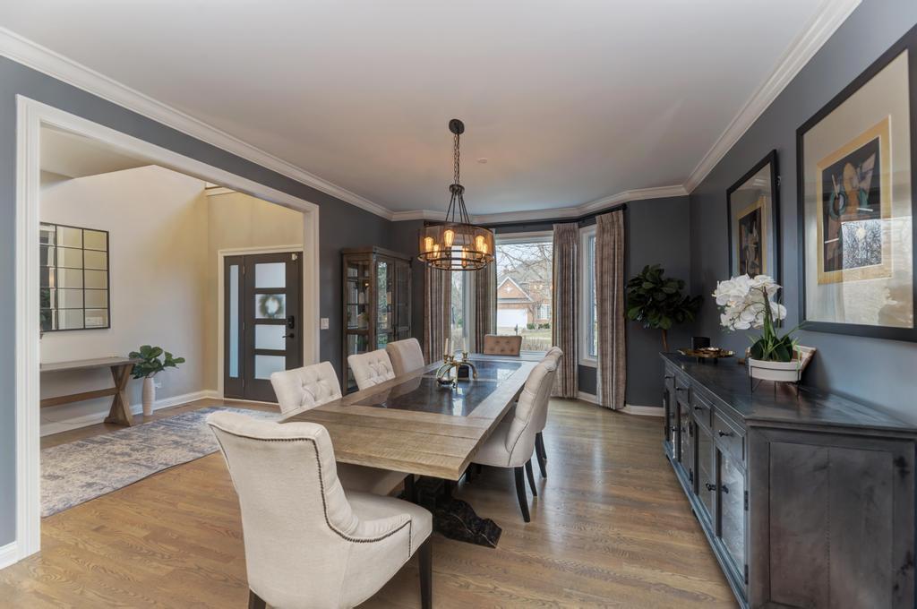1061 Sean Circle Darien, IL 60561 - Photo 5 of 50 a dining room with furniture window and wooden floor