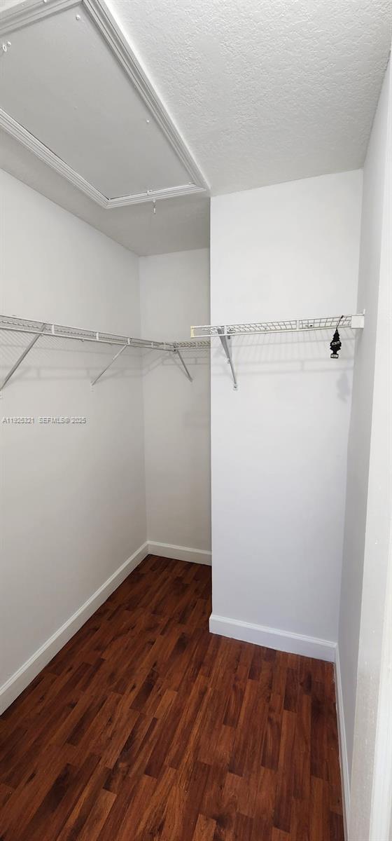 2940 Southeast 15th Terrace, Unit 2940 Homestead, FL 33035 - Photo 13 of 28 a view of a room with wooden floor