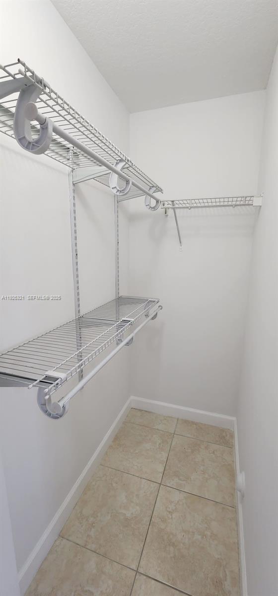 2940 Southeast 15th Terrace, Unit 2940 Homestead, FL 33035 - Photo 19 of 28 a bathroom with a shower