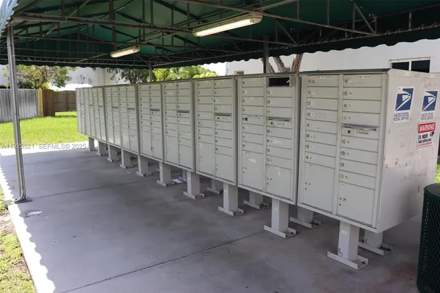 a view of a balcony with two chairs