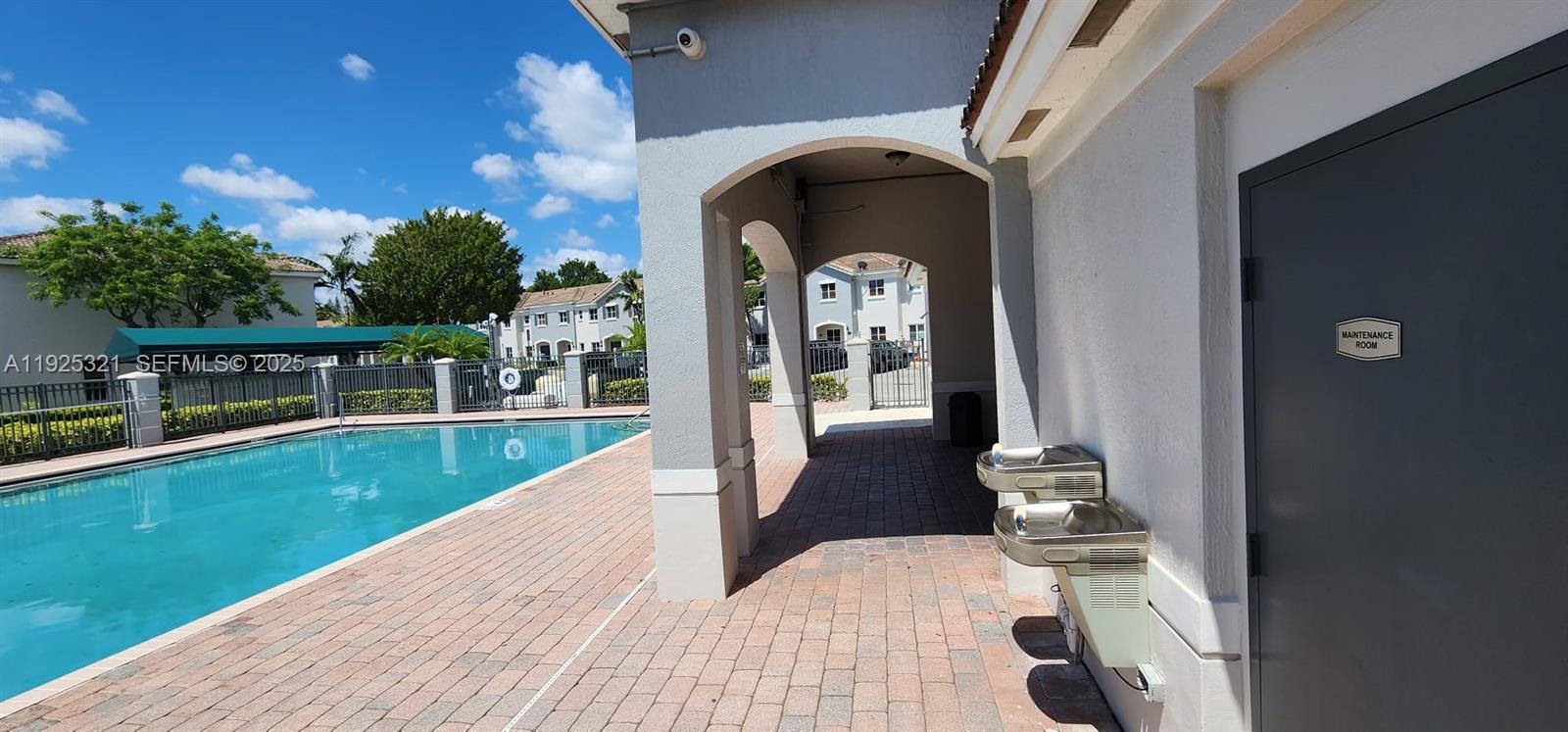 2940 Southeast 15th Terrace, Unit 2940 Homestead, FL 33035 - Photo 27 of 28 a view of a balcony with two chairs