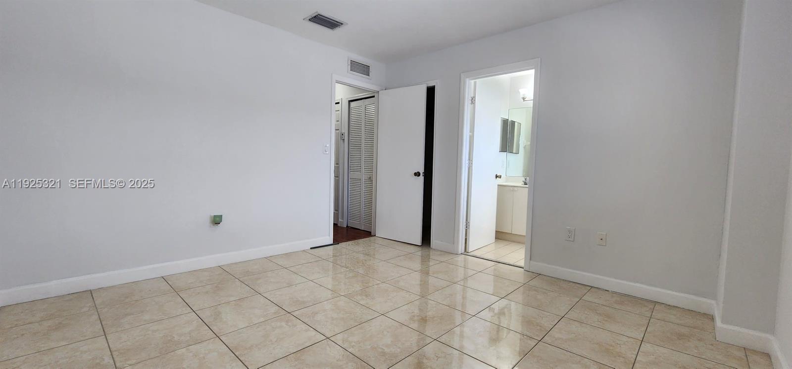 2940 Southeast 15th Terrace, Unit 2940 Homestead, FL 33035 - Photo 3 of 28 a view of an empty room