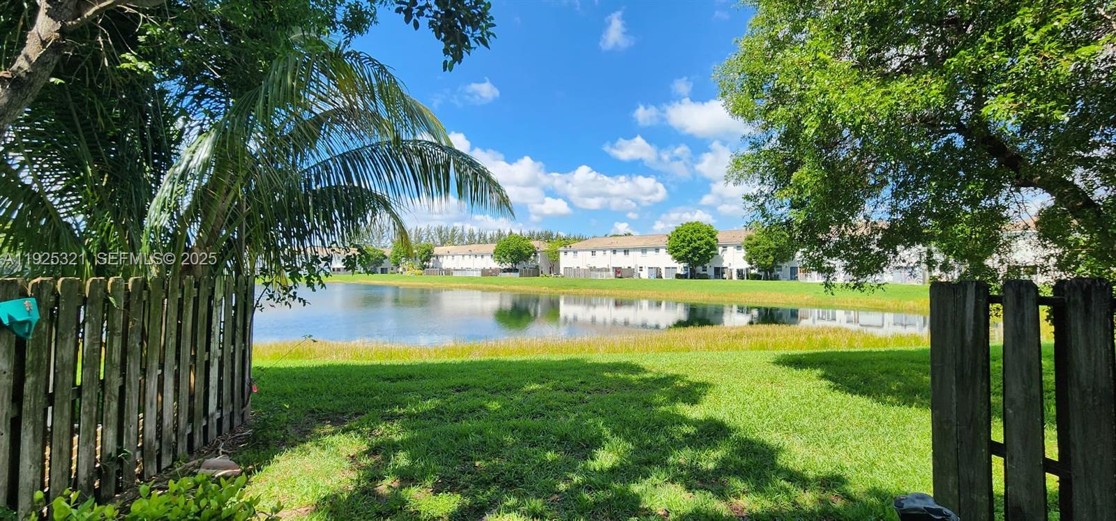 2940 Southeast 15th Terrace, Unit 2940 Homestead, FL 33035 - Photo 4 of 28 a view of lake from a yard