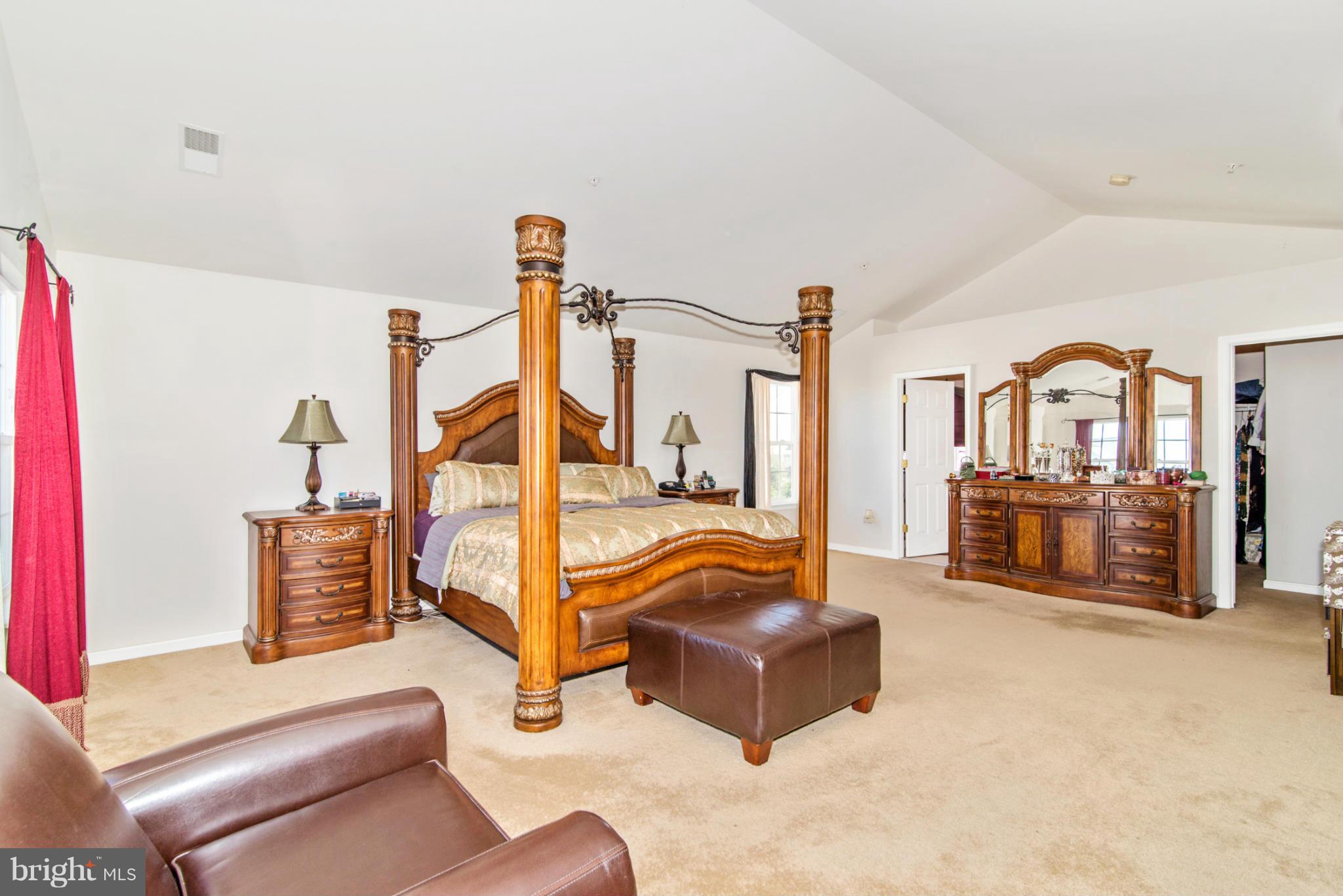 14625 Bubbling Spring Road Boyds, MD 20841 - Photo 16 of 30 a living room with furniture and a flat screen tv