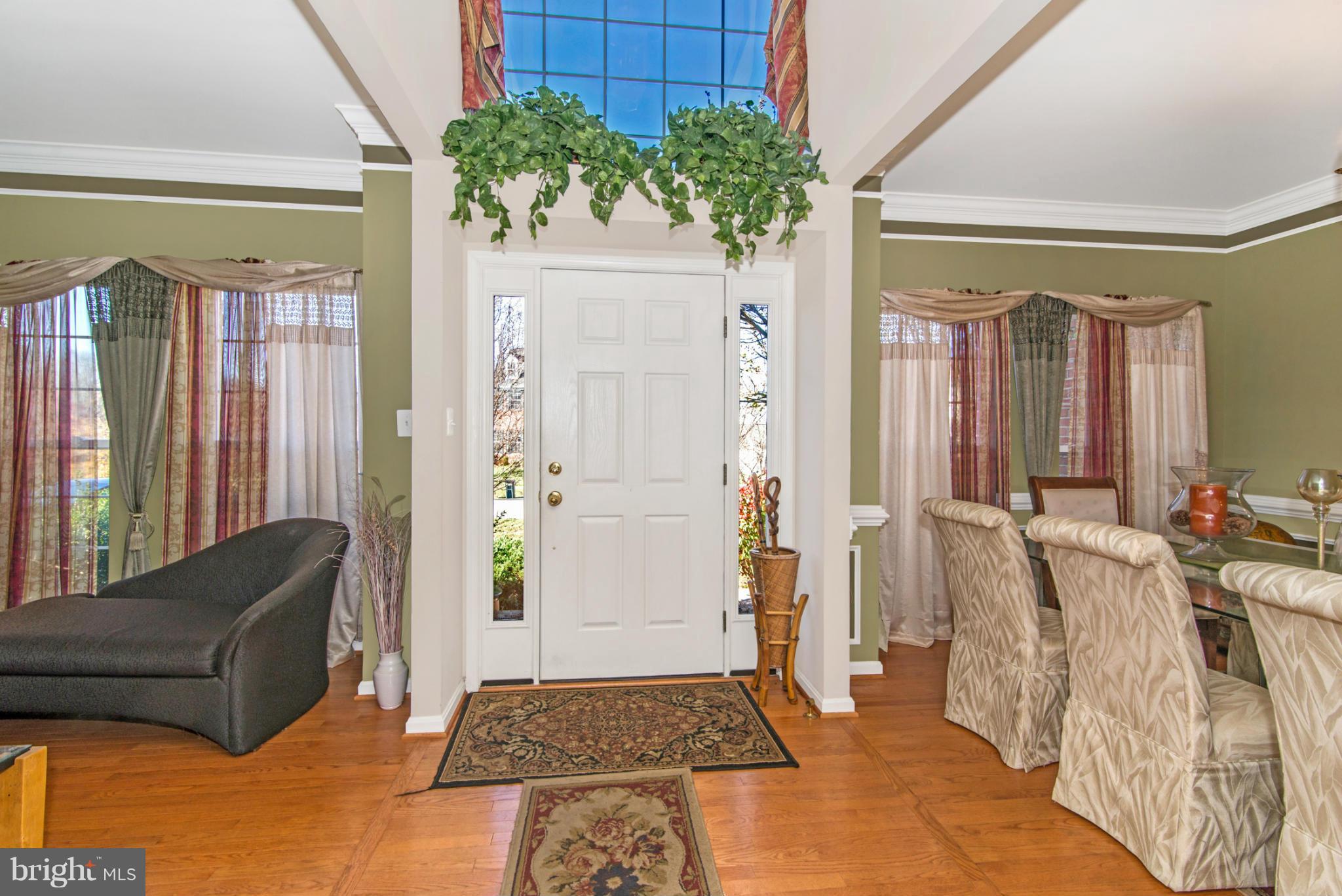 14625 Bubbling Spring Road Boyds, MD 20841 - Photo 3 of 30 a living room with furniture and a potted plant