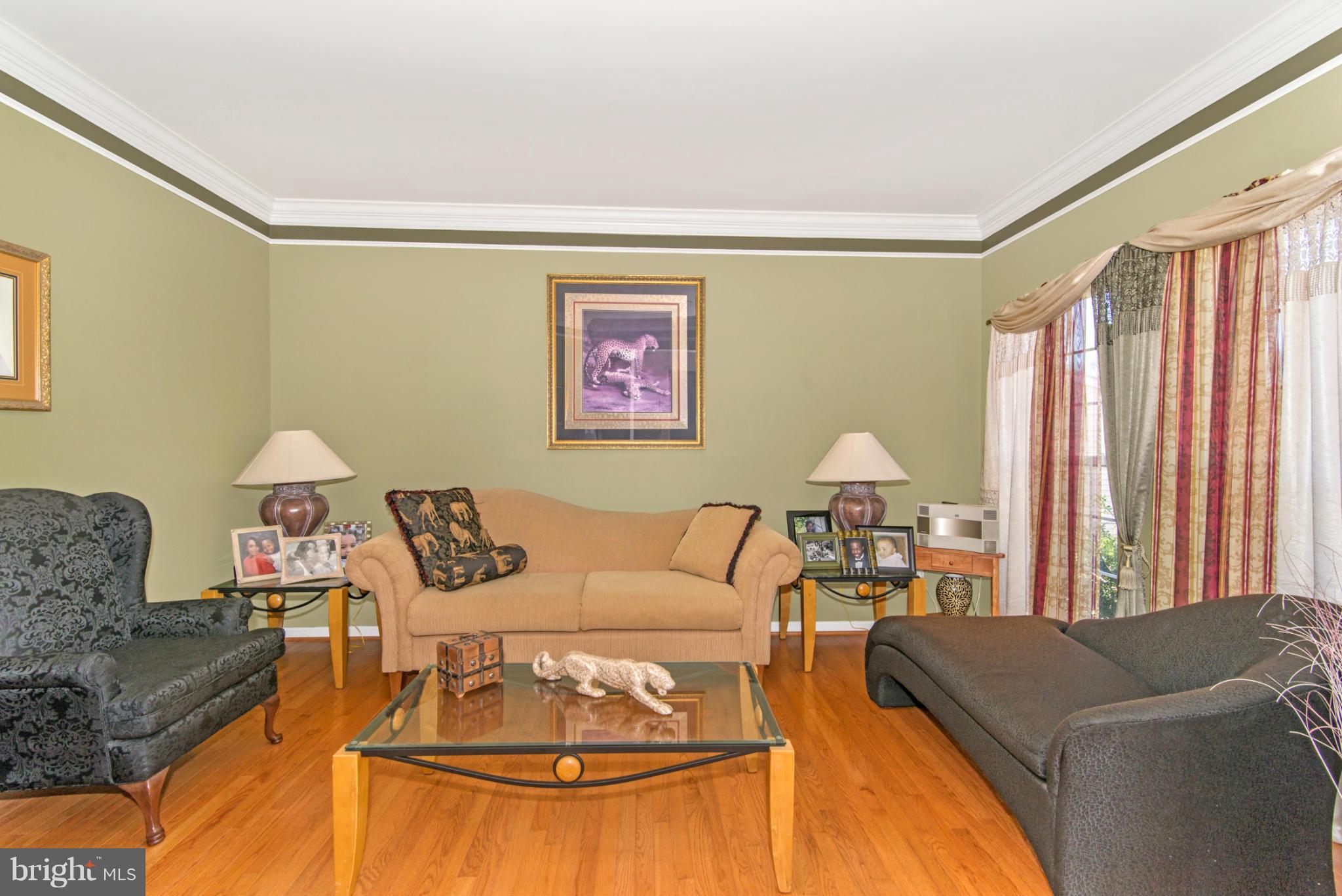 14625 Bubbling Spring Road Boyds, MD 20841 - Photo 4 of 30 a living room with furniture and a large window