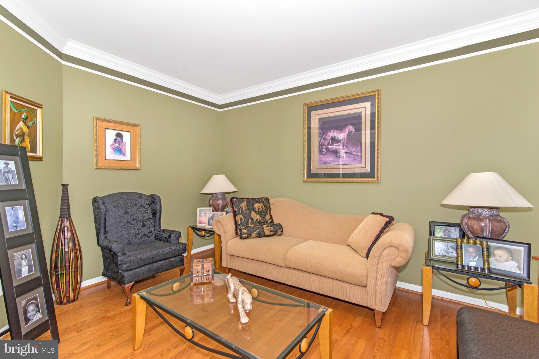 14625 Bubbling Spring Road Boyds, MD 20841 - Photo 5 of 30 a living room with furniture and a lamp
