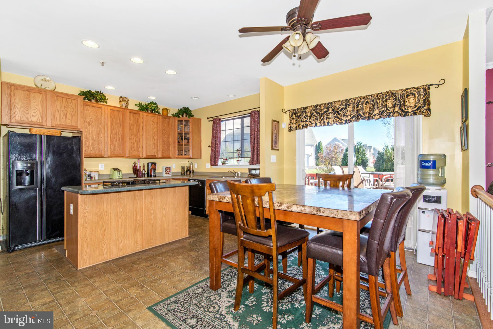 14625 Bubbling Spring Road Boyds, MD 20841 - Photo 8 of 30 a view of a dining room with furniture window and outside view