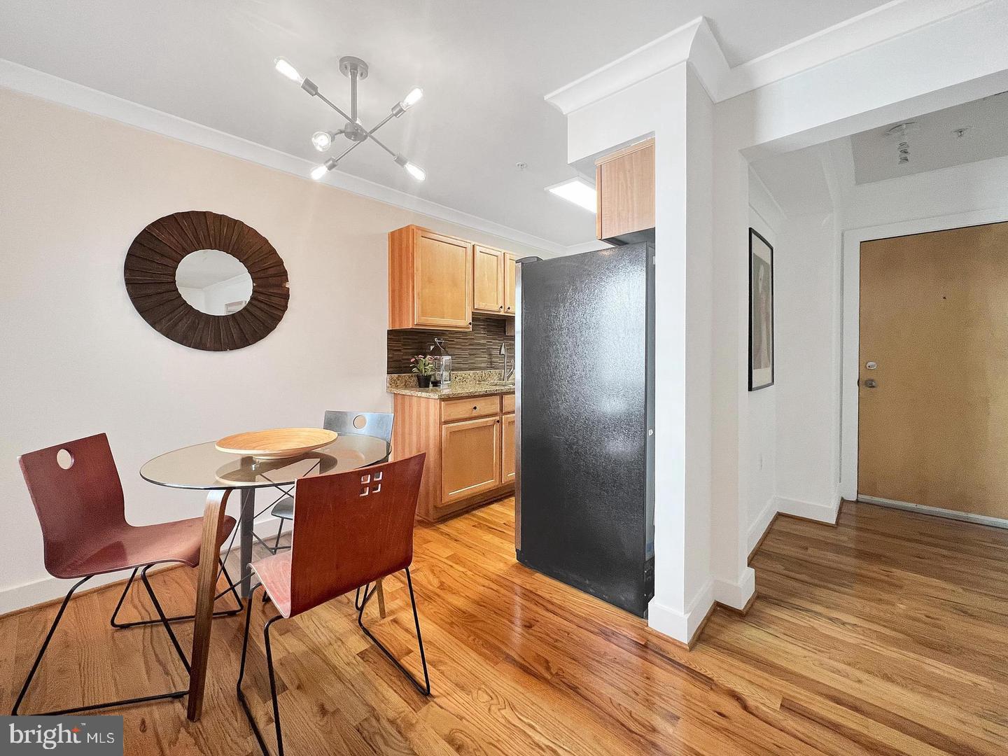 2615 4th Street Northeast, Unit 306 Washington, DC 20002 - Photo 5 of 13 a kitchen with stainless steel appliances granite countertop a refrigerator and a stove top oven