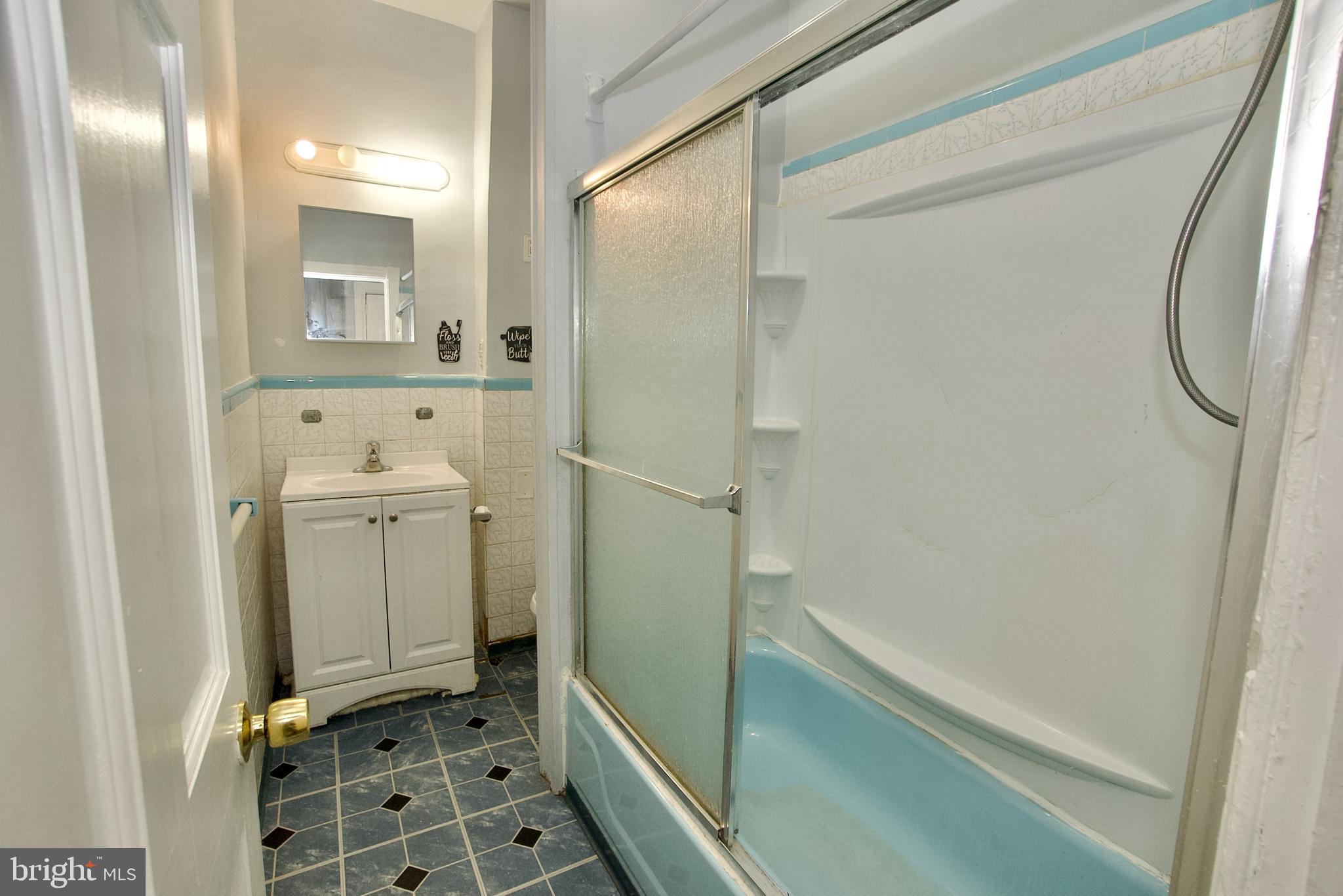 1361 East Rittenhouse Street Philadelphia, PA 19138 - Photo 12 of 20 a bathroom with a sink and a mirror