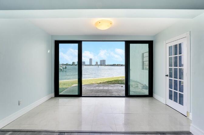 360 Wilma Circle, Unit 6 Riviera Beach, FL 33404 - Photo 11 of 13 a view of an entryway