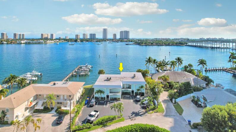 360 Wilma Circle, Unit 6 Riviera Beach, FL 33404 - Photo 2 of 13 a picture of city view with lake view and boat