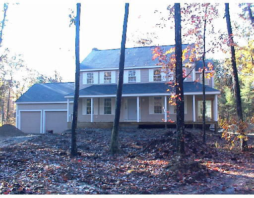 Lot 10 Groton Road Shirley, MA 01450 - Photo 1 of 1 a view of a house in the forest