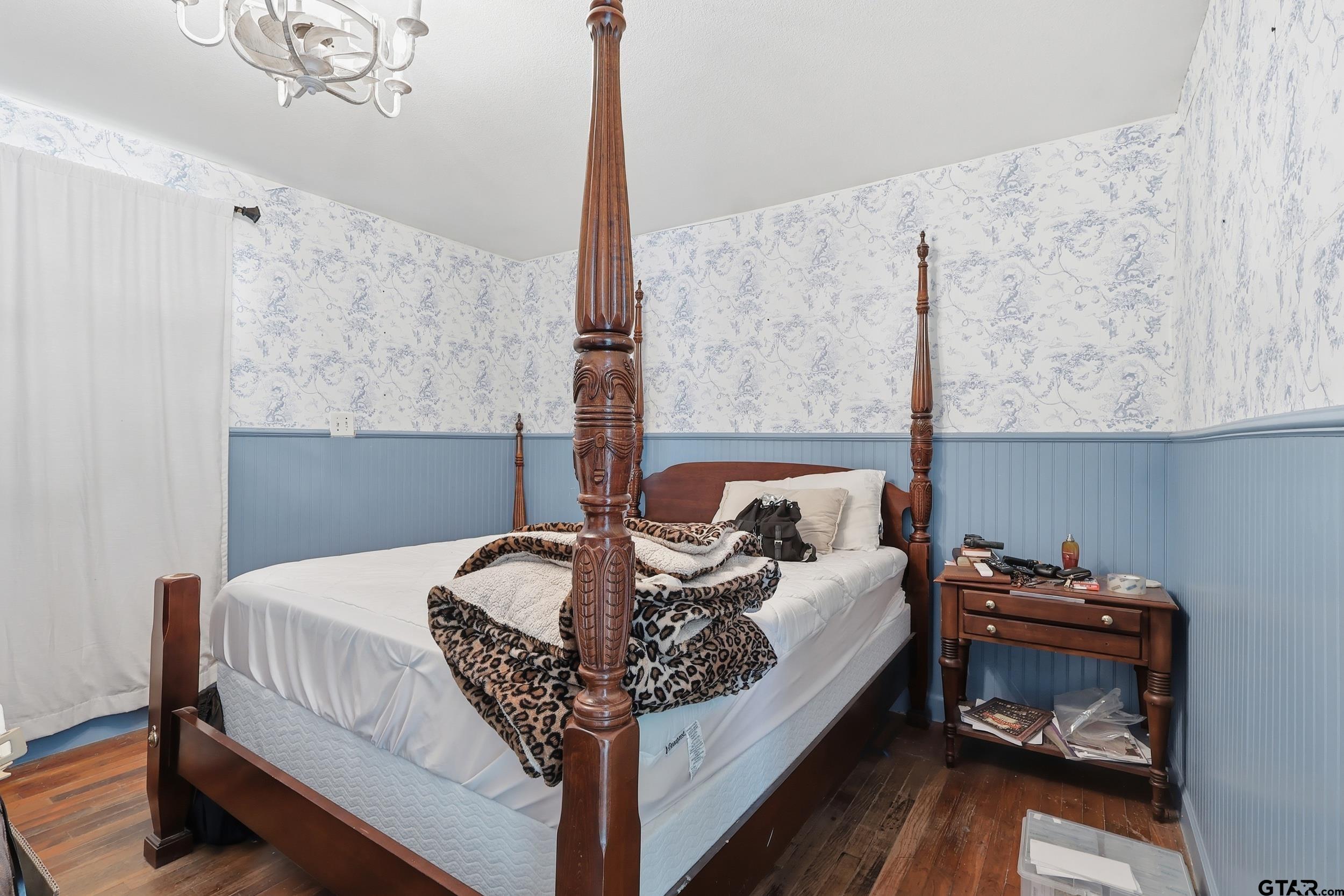 4932 Southeast Acc Road Mount Vernon, TX 75457 - Photo 15 of 35 a bed room with a bed and a couch