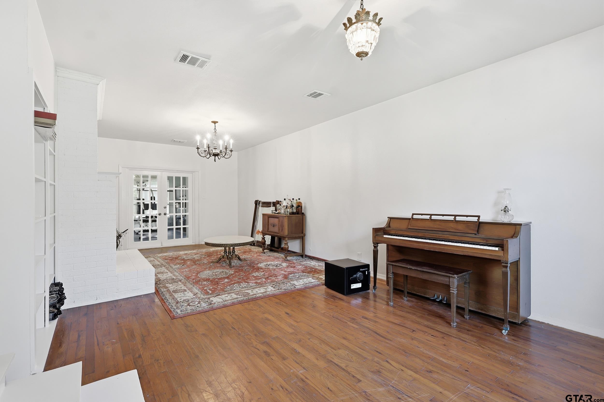 4932 Southeast Acc Road Mount Vernon, TX 75457 - Photo 6 of 35 a living room with furniture and a piano