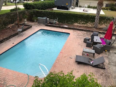2628 Marcinski Road Jupiter, FL 33477 - Photo 15 of 18 a view of a backyard with sitting area