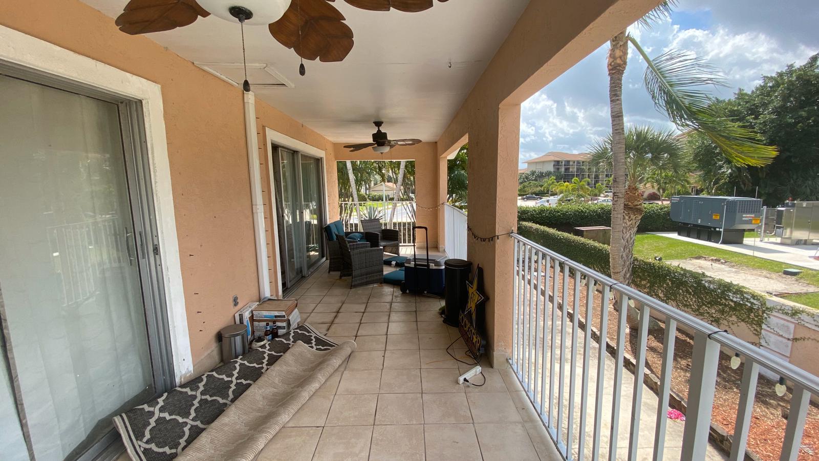 2628 Marcinski Road Jupiter, FL 33477 - Photo 18 of 18 a view of balcony with couch